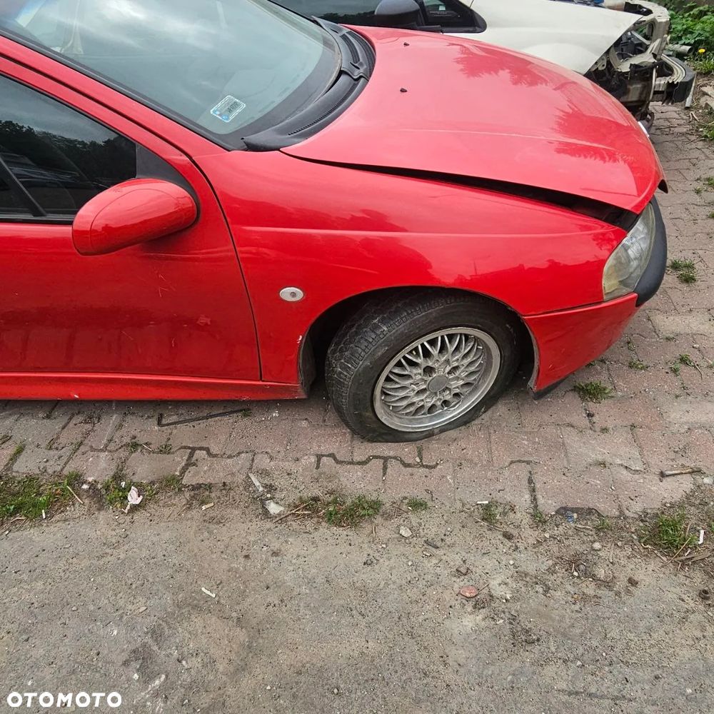 Opel Tigra  (kod lak: Y547) maska zderzak drzwi szyby lusterko wahacz klapa - 2