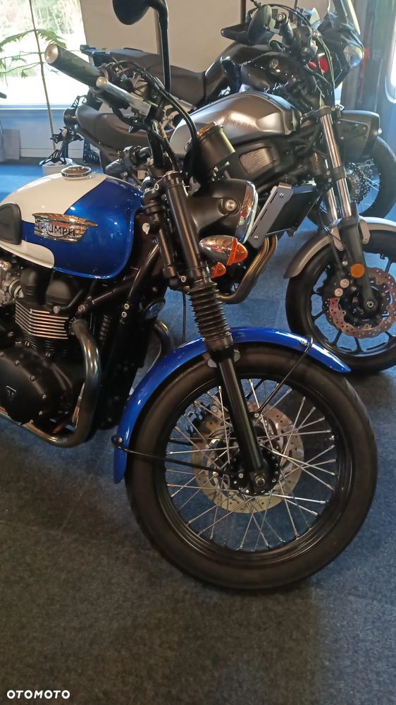 Triumph T - 4
