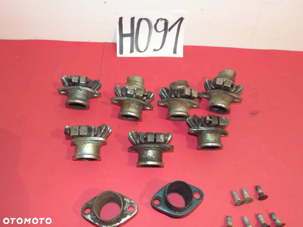 HONDA CB 750 FOUR . KLAMRA MOCOWANIE UCHWYT WYDECH KOLEKTORA Króciec Kolektora  H091 - 5