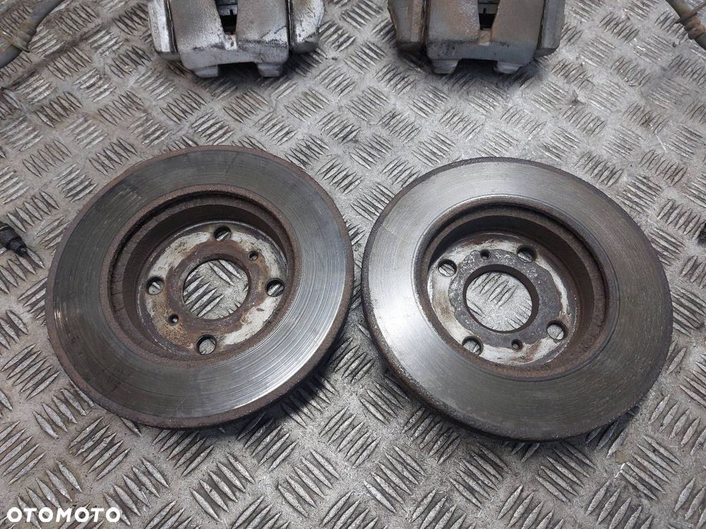 TARCZE HAMULCOWE PRZÓD + KLOCKI + ZACISKI TOYOTA YARIS I 1.3 16V - 3
