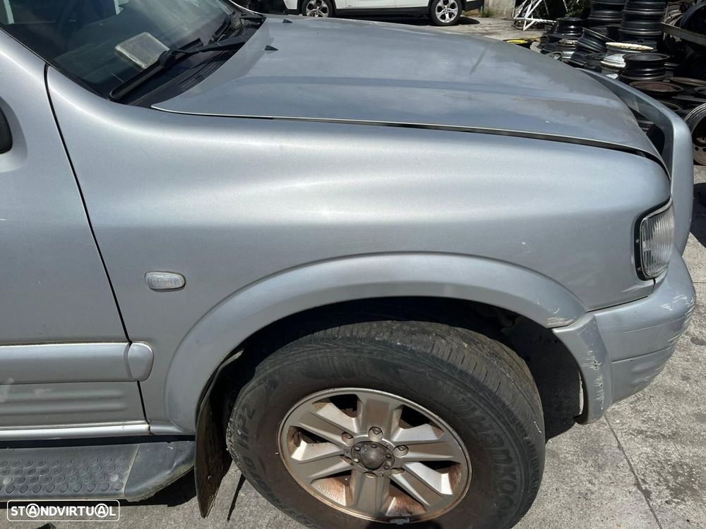 GUARDA-LAMAS FRENTE DIREITO OPEL FRONTERA B - 1