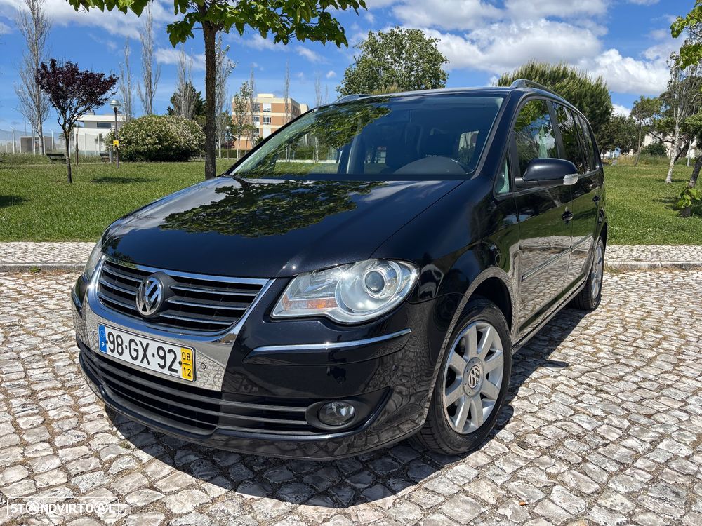 VW Touran 1.9 TDi Highline DSG 7L - 1