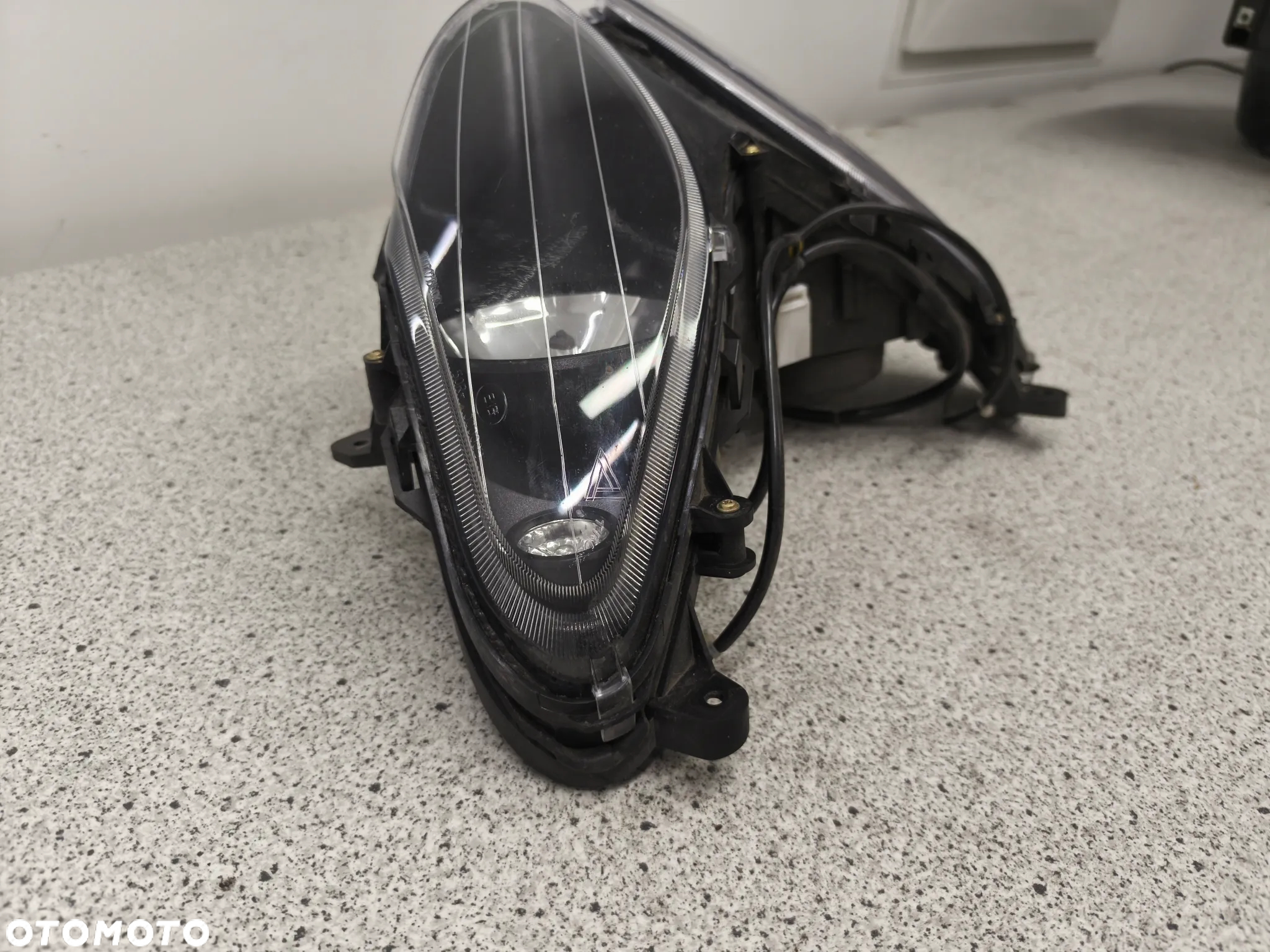 Lampa przód, przednia, reflektor Piaggio NRG - 14