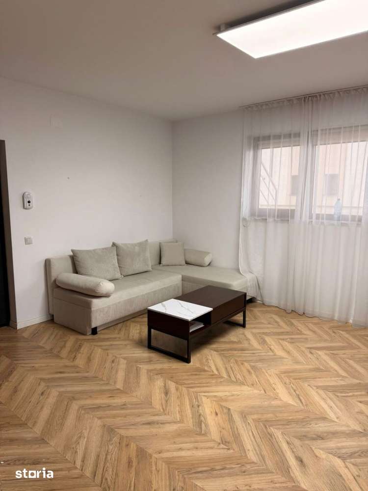Apartament de 50 mp utili,parcare inclusa, zona Vivo — fotografia 1
