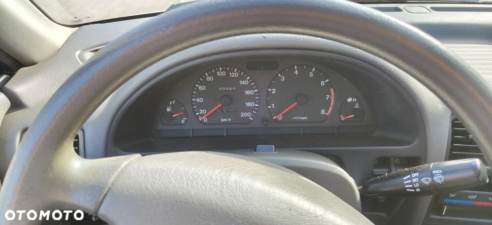 Suzuki Swift 1.0 GLX - 9