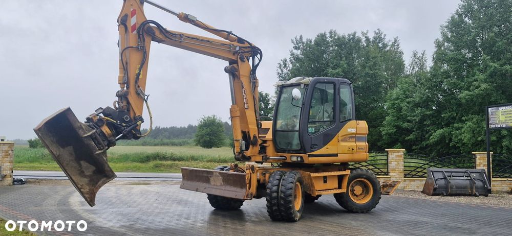 Case WX125/ Rototilit Engcon/ Maszyna sprowadzona/ - 2