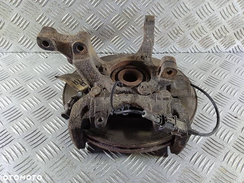 ZWROTNICA PRAWA PRZEDNIA OPEL ASTRA H - 1