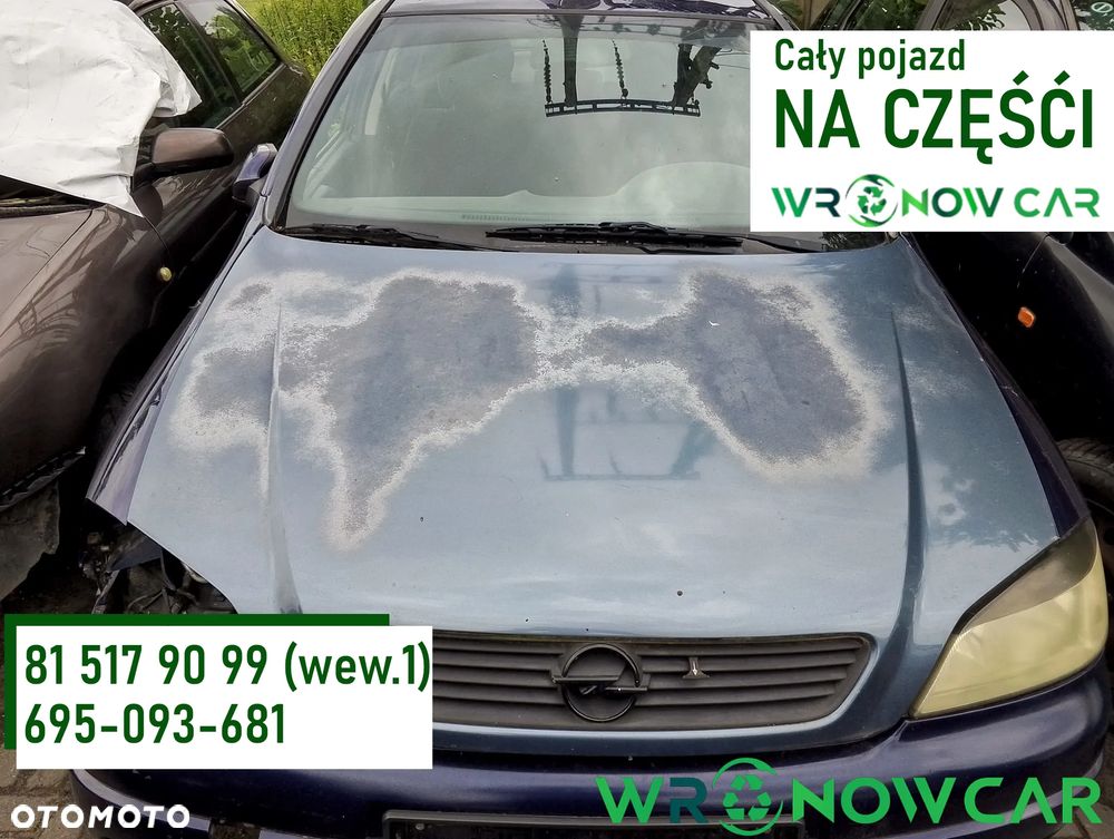 Opel Astra G (98-09r.) 1.4B 89KM. Silnik X14XE Skrzynia MG4 lakier Z282 / 13L / 13U. Cały na części. GWARANCJA !!! Przód Tył Zestaw Komplet Drzwi Klapa Zderzak Błotnik Maska Grill Atrapa Szyba Pas Lampa Lusterko Boczki Fotel Kanapa Kokpit Deska Rozdzielcza Przełącznik Włącznik Sterownik Przewody Wiązka Instalacja Moduł Komputer Czujnik Listwa Pompa Alternator Wtryski Głowica Rozrusznik Kompresor Sprzęgło Dwumas Silnik Skrzynia ABS Klimatyzacji Paliwa Wspomagania Kolektor Turbina Przepustnica Zawór Chłodnica Koło Hak Belka Sanki Zawieszenie Mcpherson Półoś Amortyzator Wydech Tłumik Zacisk Most - 1