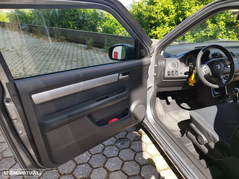 Suzuki Swift 1.3 DDiS GLX - 9