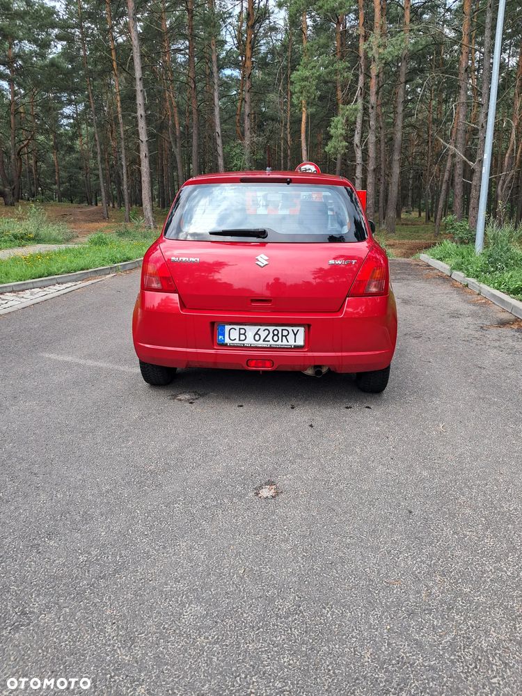 Suzuki Swift 1.3 Club - 4