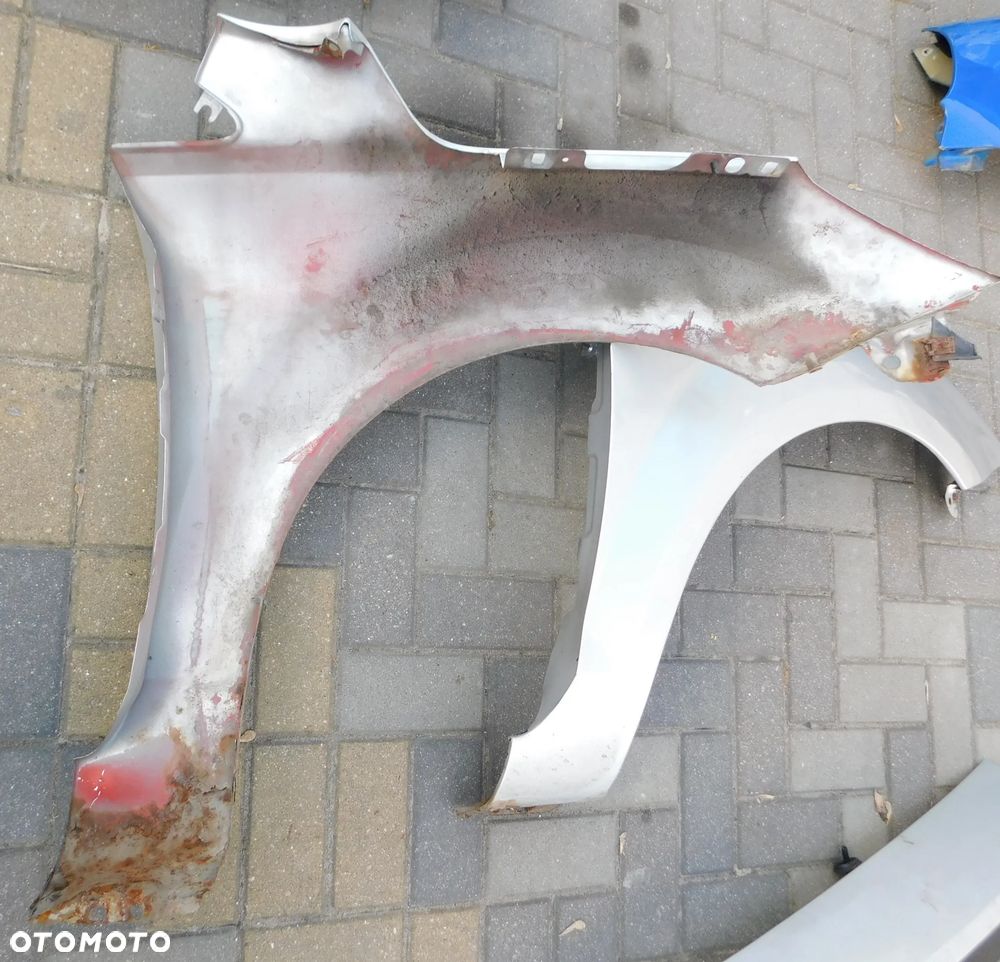 błotnik lewy przód FORD FOCUS II LIFT FL  03 - 8