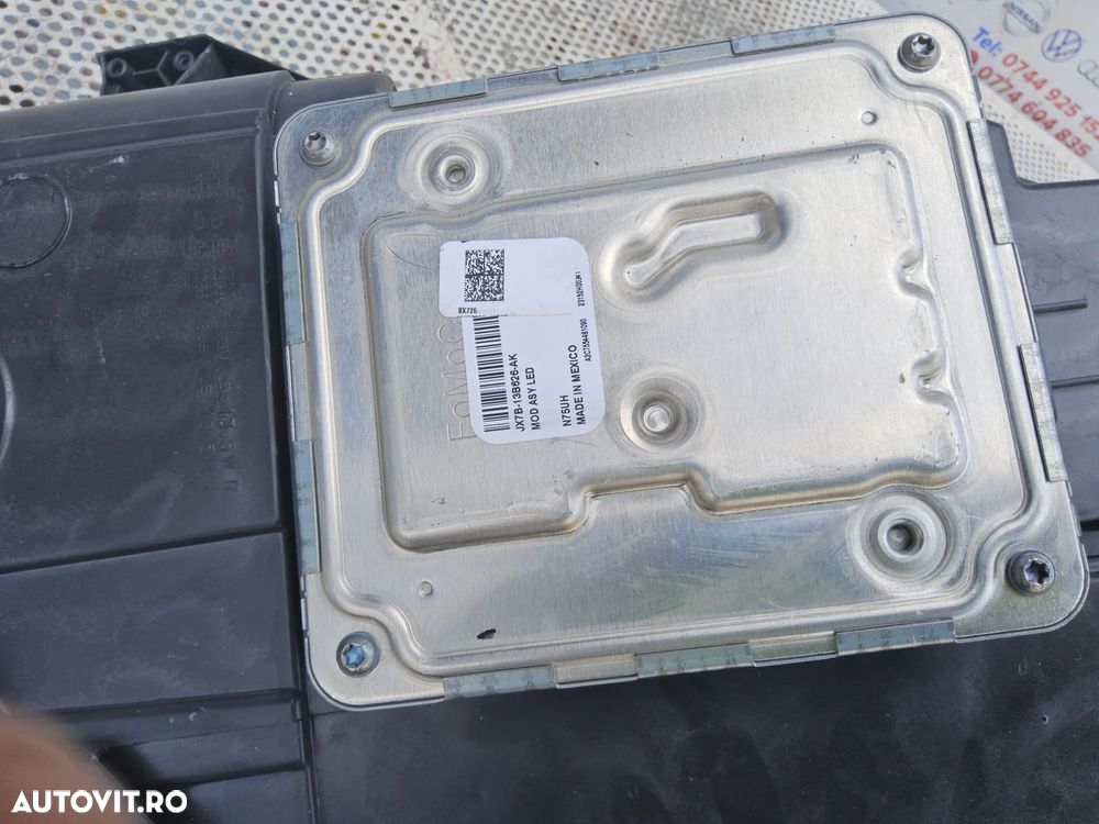 Far Led dreapta Ford Puma  cod l1tb13e014mb far led dreapta cu 1 ureche rupta mic defect - 7