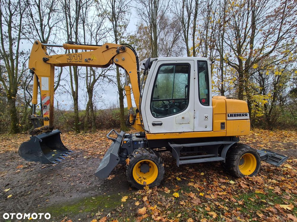 Liebherr A 311 Litronic - 2