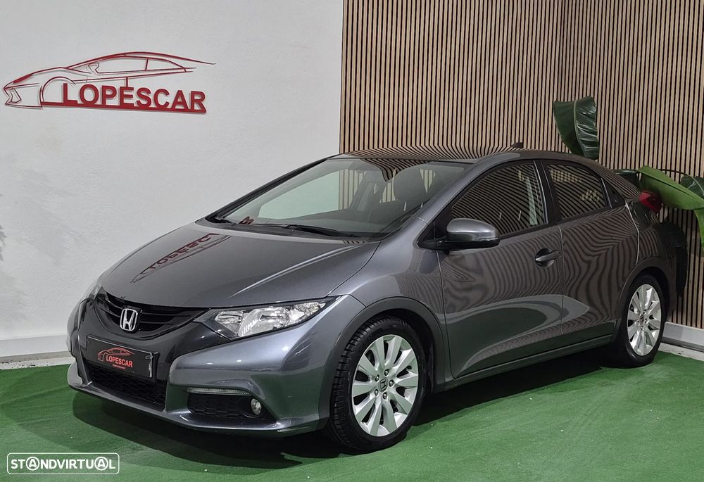 Honda Civic 1.4 i-VTEC Elegance - 1