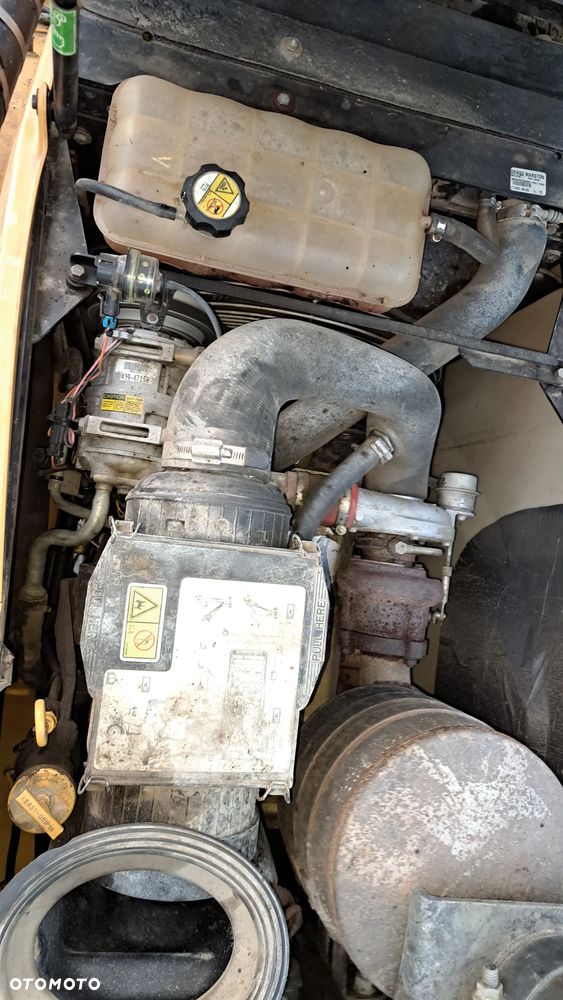 Caterpillar 428E - 6