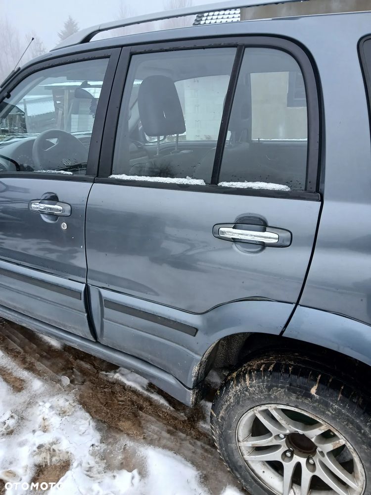 Suzuki Grand Vitara 2.0 - 7