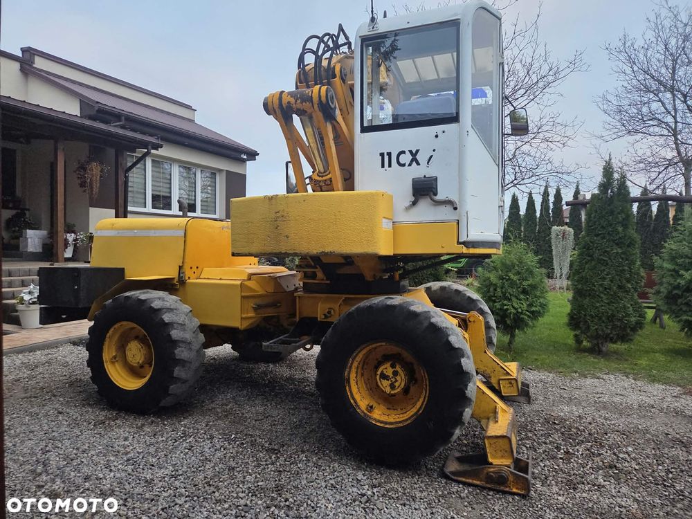 Mecalac 11CX i - 16