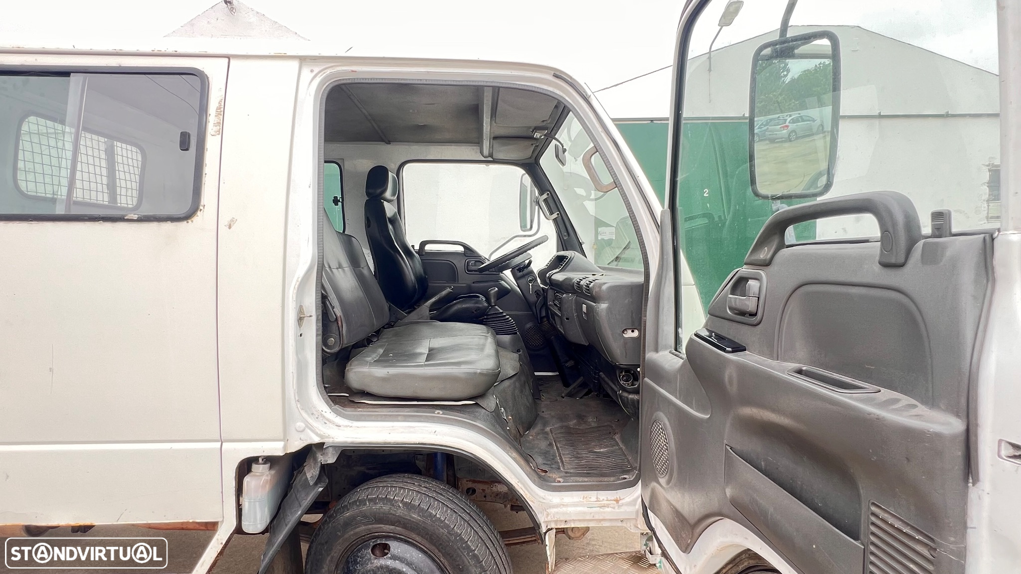 Isuzu NKR 55 LL5 D 7 lugares 2.8 d - 10