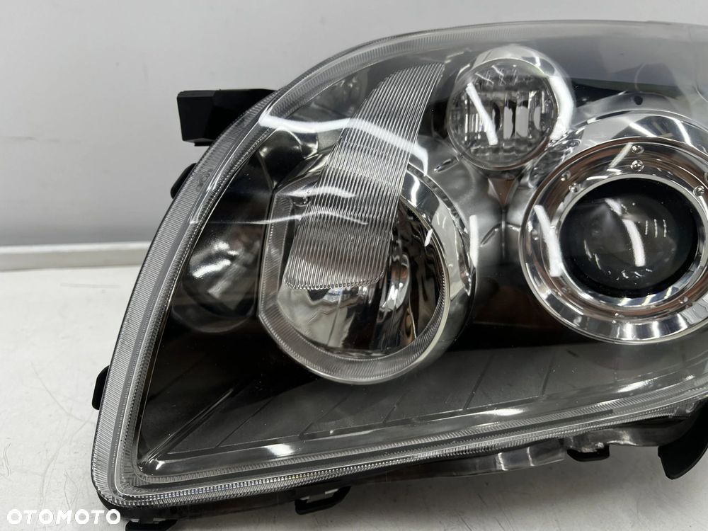 Lampa reflektor Toyota Avensis 2 II T25 LIFT 06-09r. lewa przednia EU H7 soczewka lewy przód 81170-0 - 4