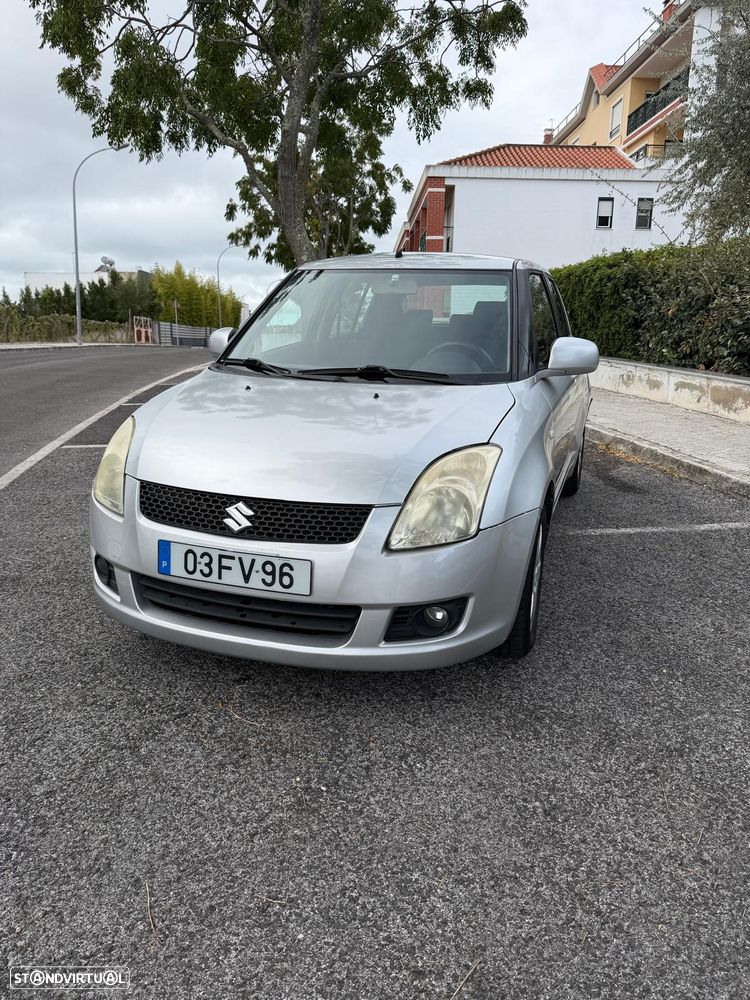 Suzuki Swift 1.3 DDiS GLX - 1