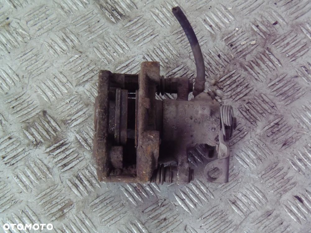ZACISK HAMULCOWY PRAWY TYŁ OPEL MERIVA A - 3