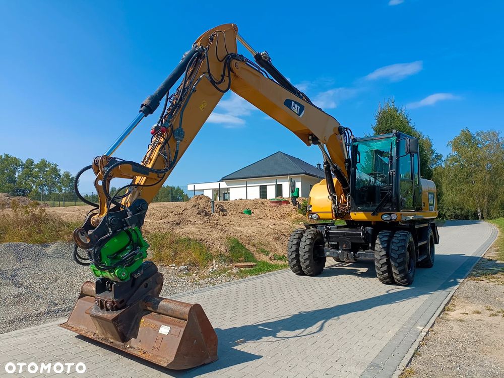 Caterpillar M313D - 3