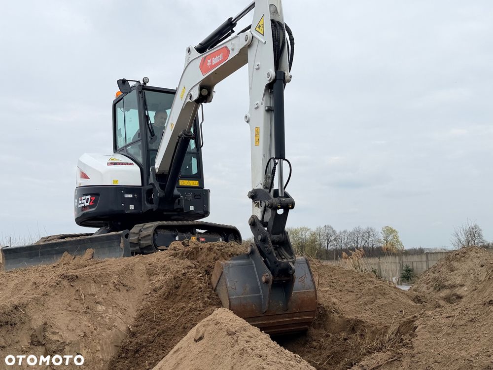 Bobcat Minikoparka Bobcat e50Z 5ton e55 e60 Cat 303.5 304  305 3xłyżki Ramię LOONG dodatkowe linie hydr wyjścia AUX1 + 2 przeciw waga MAX-dociążenie gąsienice 85% od nowości 1 właściciel z Niemiec Auto IDLEE po serwisie Widły wiertnica grabie i inne za dopłatą Szybkozłącze hydr Miller łyżka przedsiębierna Pług  Kubota Takeuchi Jcb - 7