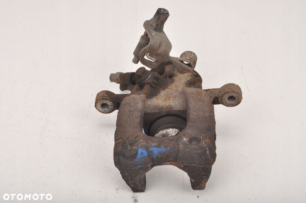 SKODA OCTAVIA II ZACISK HAMULCOWY PRAWY TYŁ KOMBI - 1