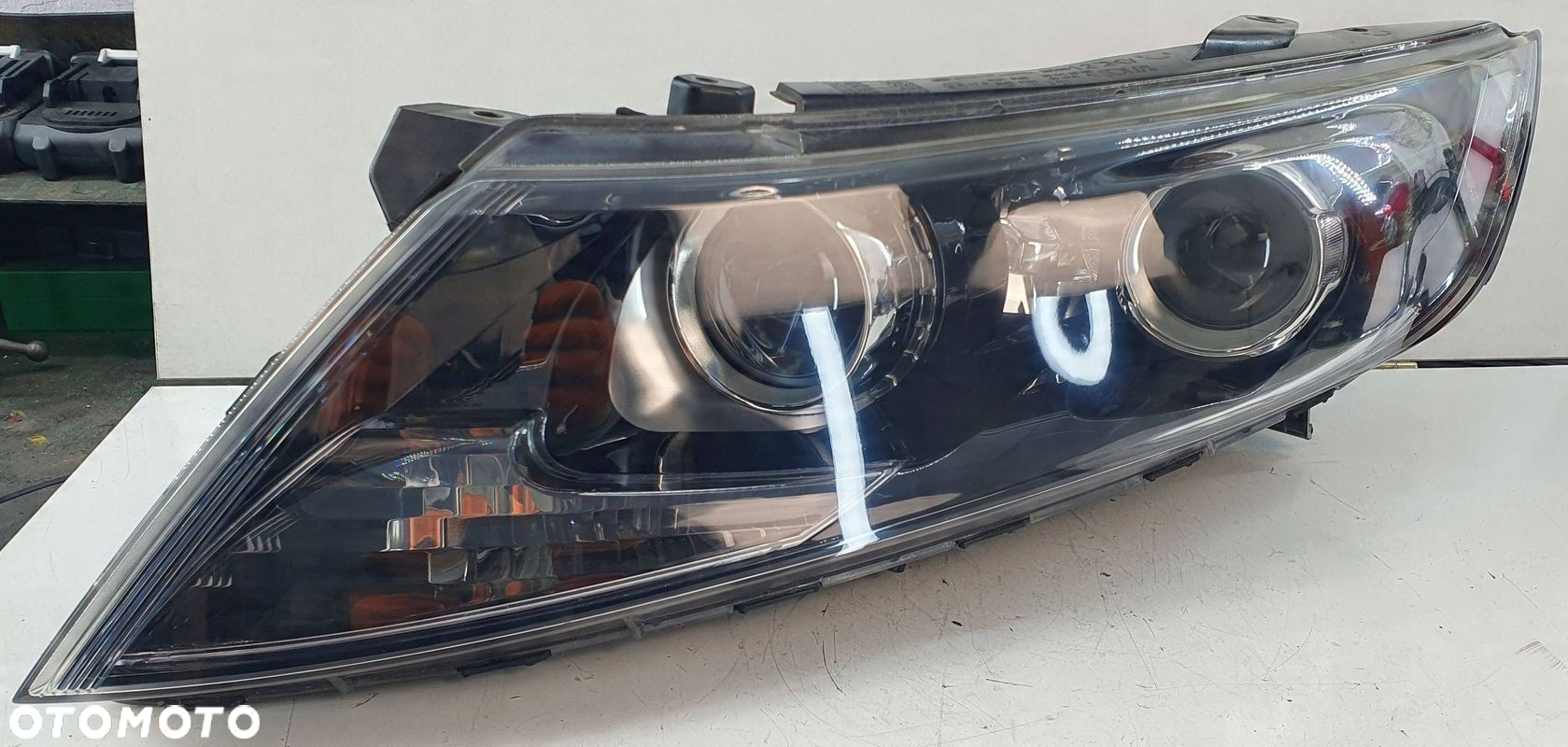 KIA Optima 3 III 10- lewa lampa przednia przód reflektor € - 2