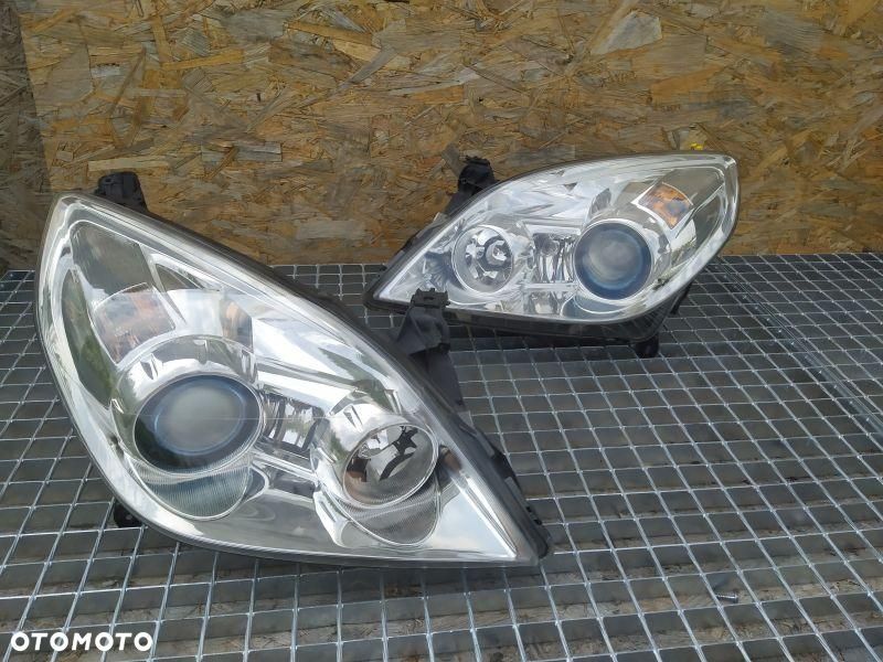 REFLEKTOR 2 SZT KPL EUROPA BIKSENON SKRĘTNY OPEL VECTR C LIFT 13170934 - 1