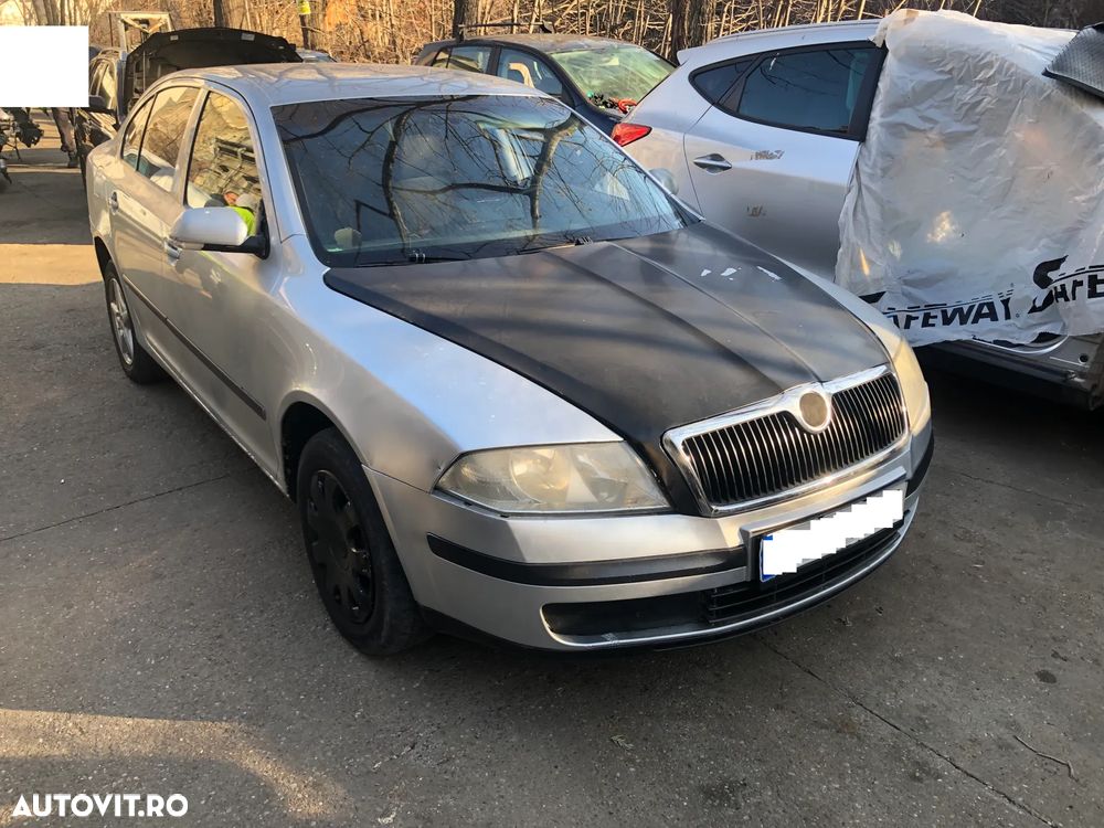 Dezmembrez Skoda Octavia 2 1.6 benzina gri argintiu 2006 - 1