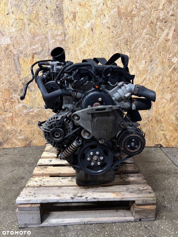 SILNIK OPEL ASTRA H MERIVA CORSA D Z14XEP 1.4 16V KOMPLETNY Z OSPRZĘTEM film video - 1