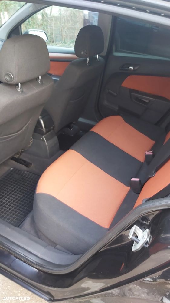 Opel Astra 1.4i Cosmo - 11