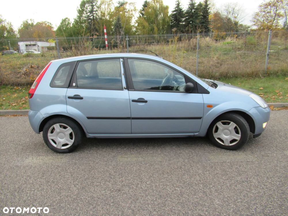 Ford Fiesta 1.4 Ghia - 7