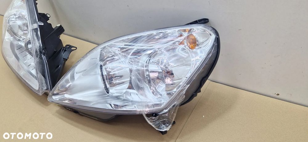 LAMPA LAMPY PRZÓD PRZEDNI ZAFIRA B 2008- lift NOWE - 2