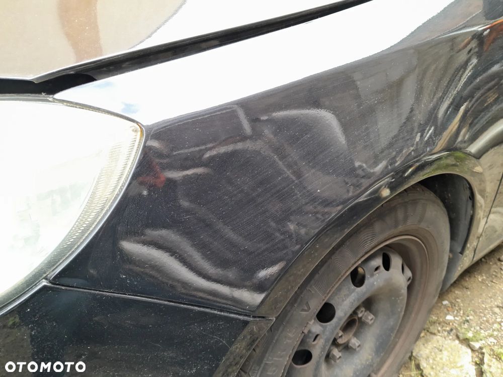 Błotnik przedni lewy SKODA Fabia II 07-10r. 9910 - 4