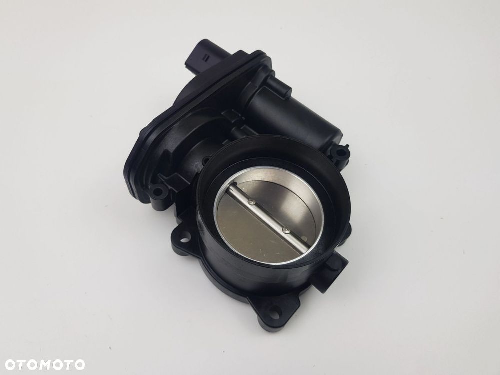 NOWA ORYGINALNA Przepustnica Volkswagen Audi Seat Skoda 04E133062S - 2