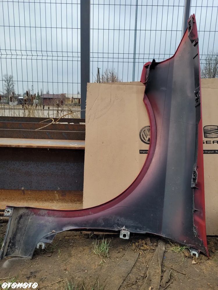 BŁOTNIK LAGUNA II PRAWY LEWY PRZÓD - 16