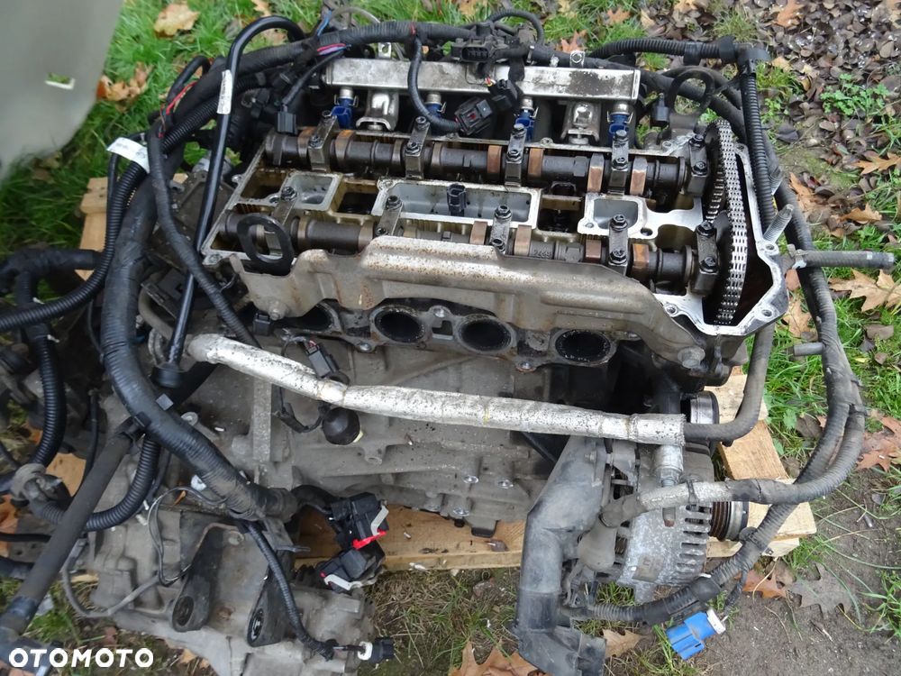 FORD MAVERICK 2,3 150 KM MAZDA TRIBUTE SILNIK NA CZESCI GLOWICA BLOK WAL KORBOWODY TLOKI MISKA OLEJOWA DWUMASA SKRZYNIA BIEGOW