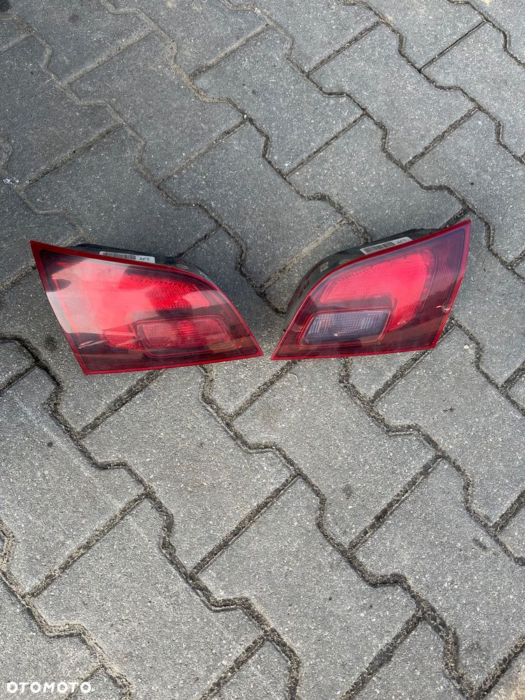 OPEL ASTRA J KOMBI LAMPA LAMPY TYLNE 2-szt 13314054 13314053
