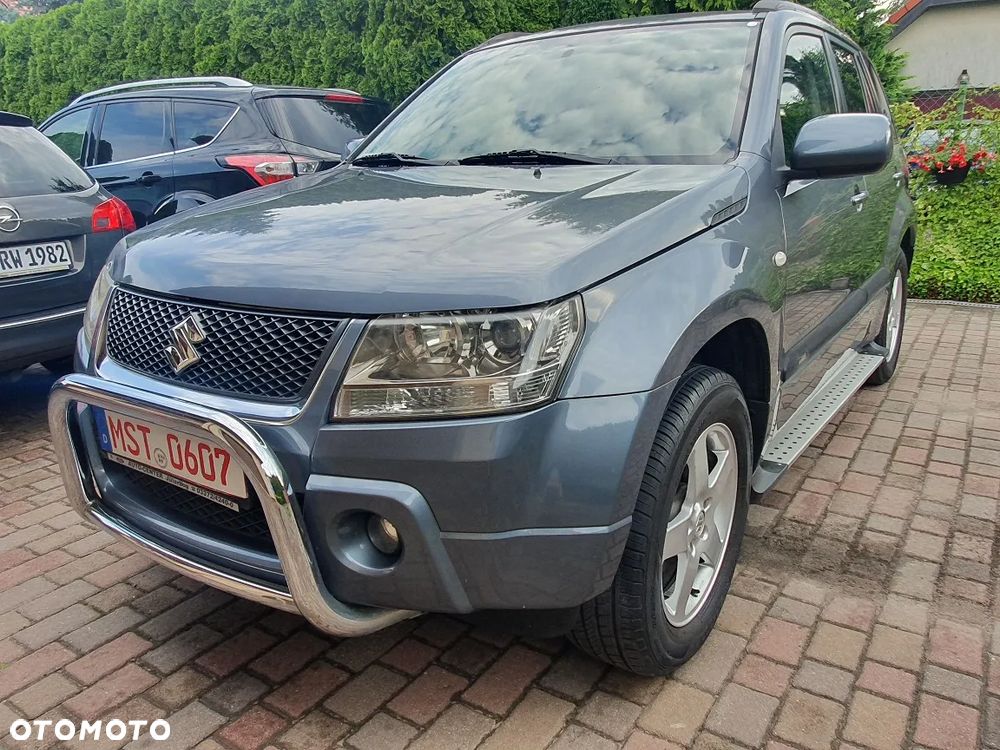 Suzuki Grand Vitara 2.0 Comfort + Family - 1