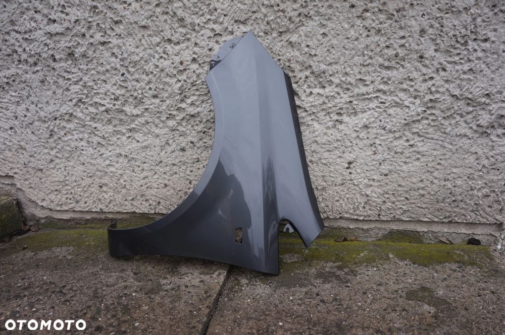 BŁOTNIK PRZEDNI LEWY OPEL CORSA D Z177 - 2