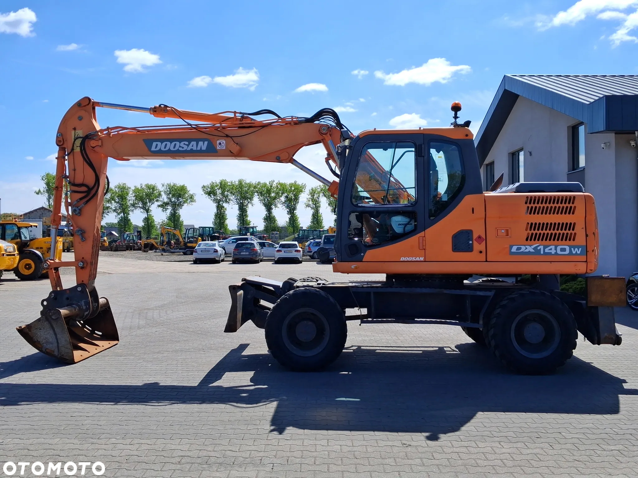 Doosan DX 140 W - 3 - 2