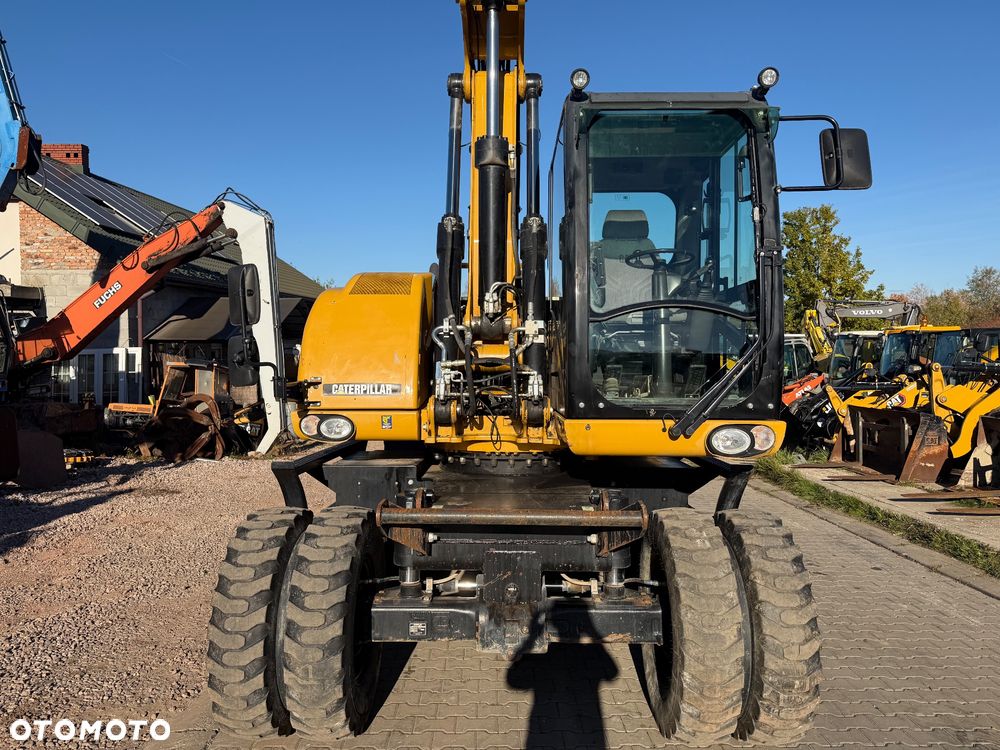 Caterpillar M316D - 12