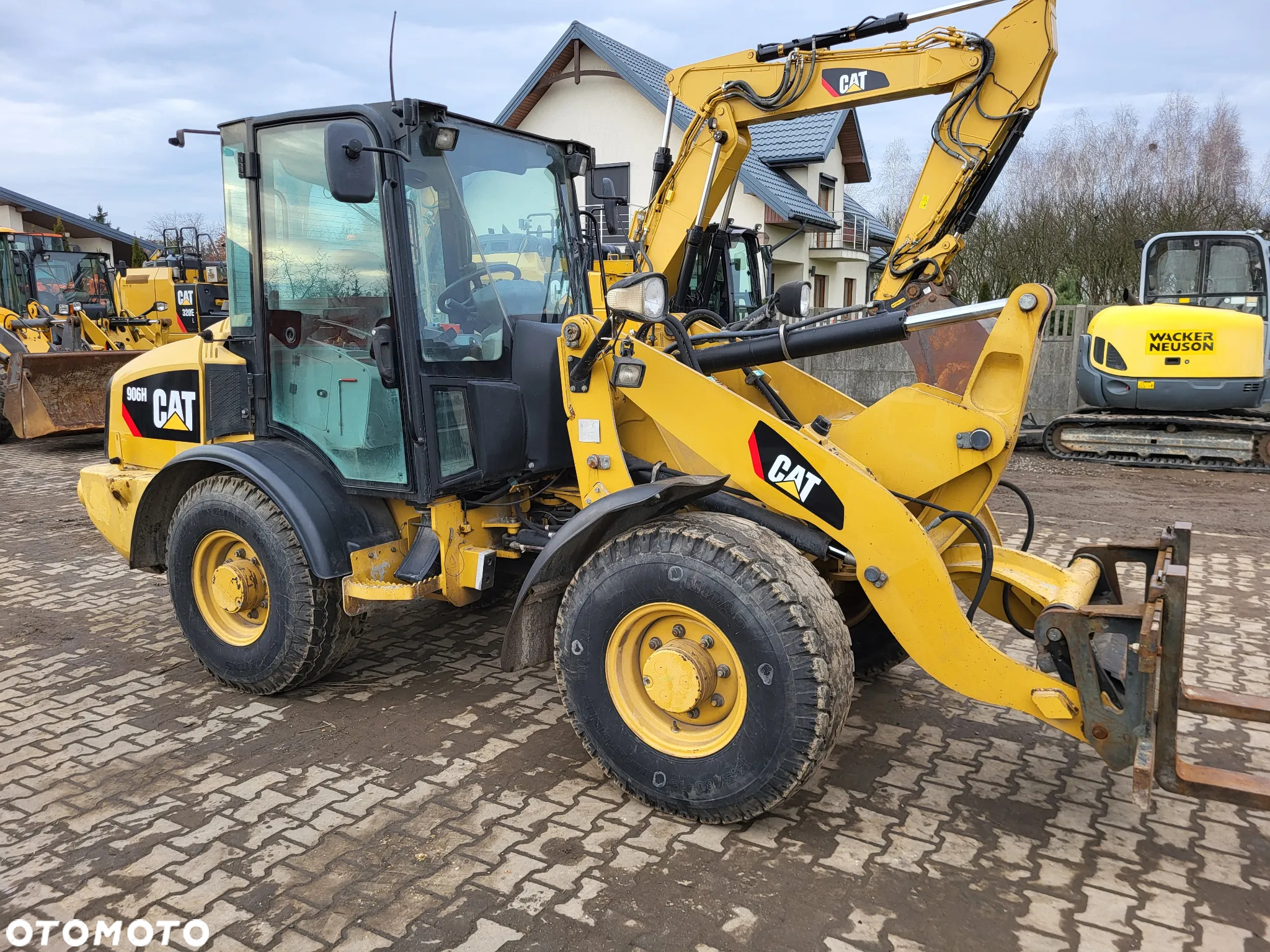 Caterpillar 906 H / z Niemiec / - 2