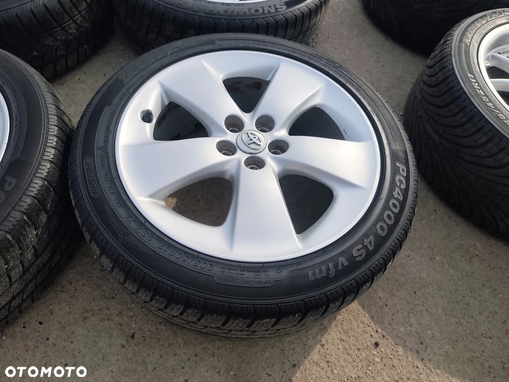 5x100 Felgi Aluminiowe Alufelgi Oryginalne 17 Koła Zimowe Całoroczne TOYOTA AVENSIS I II 2 CELICA CARINA E MATRIX PRIUS 6mm Legnica ALU-RAD 205/50 - 9