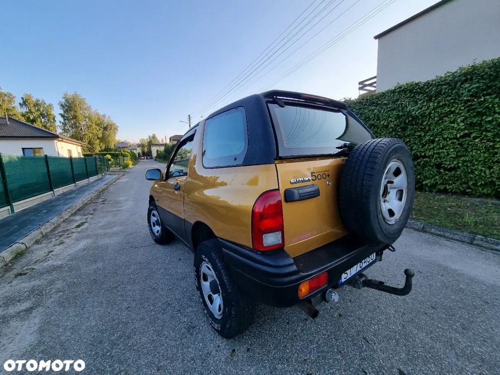 Suzuki Grand Vitara 2.0 - 7