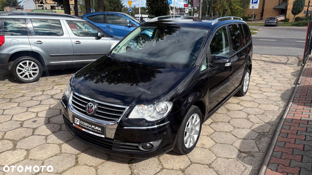 Volkswagen Touran 1.4 TSI DSG Highline - 1