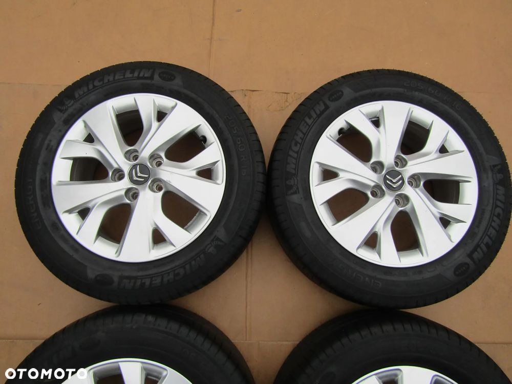 4x Felgi Aluminiowe Koła 16 Citroen C4 II Picasso Grand Berlingo III Peugeot Partner III 3 Opel Combo E 6,5 j 5x108 ET47 piasta 65,1 mm + Opony 205/60 16 Michelin Letnie - 5