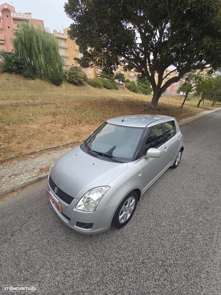 Suzuki Swift 1.3 DDiS GLX - 37